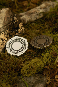 Subtle and sophisticated Flower Collar Clips designed by artist Hilary Jane, featuring her signature botanical engraving in polished metal. These elegant collar accessories add a refined touch to any collared blouse or dress, pairing beautifully with the Dakota Dress, Jane Dress, or Katherine Dress for a timeless, feminine look.
