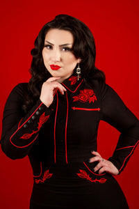 Statement June Dress made from high-quality stretch bengaline, featuring long piped sleeves with faux snap cuffs, fixed front snaps for a clean and smooth finish, and decorative rose and thorn embroidery on the collar, bust, hips, and cuffs, combining edgy dark Western style with delicate floral details, ideal for spring gatherings, parties, or fashion-forward outfits.