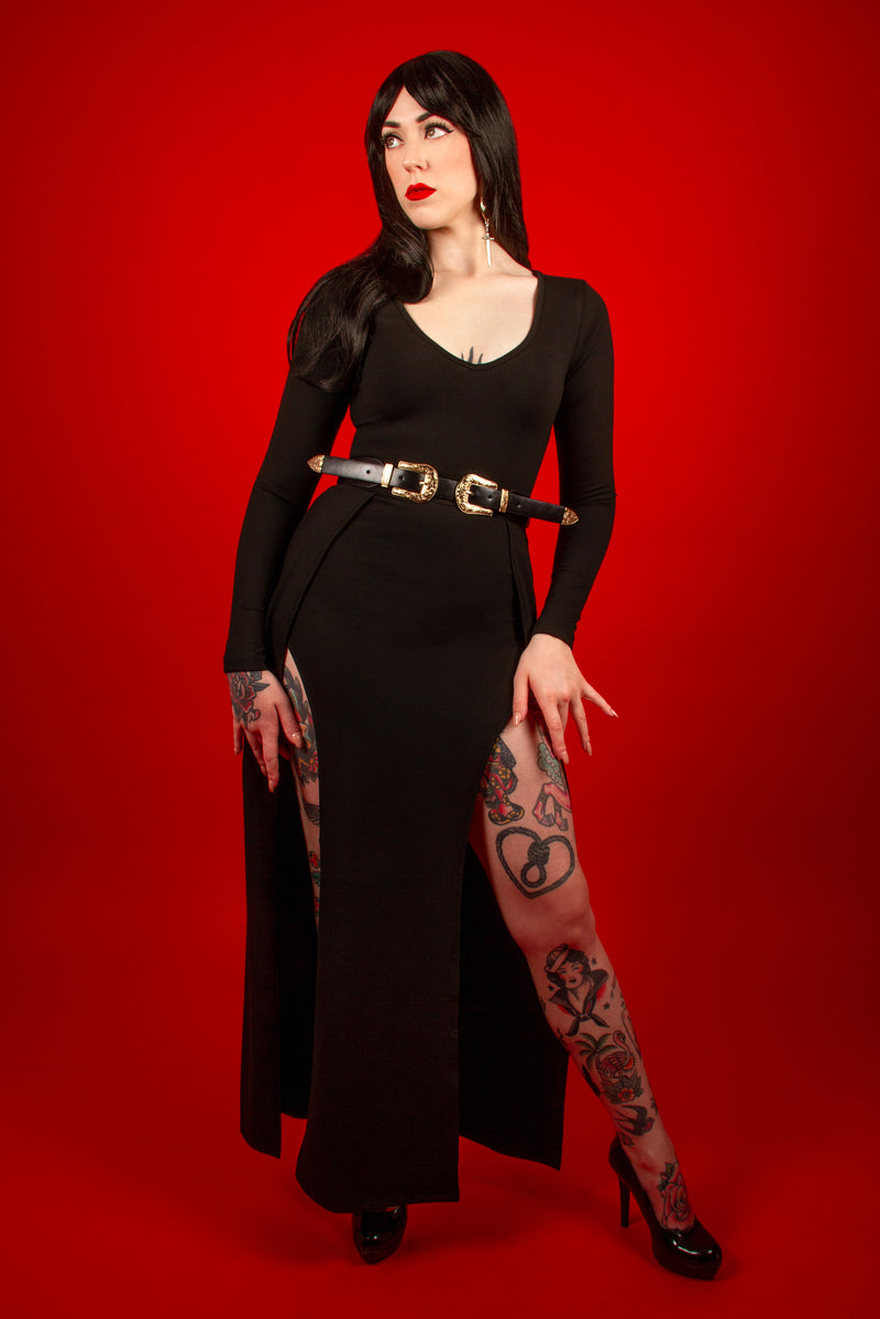 The Kassandra Maxi Dress, crafted from a premium poly blend, delivers an effortlessly chic look with its curve-hugging design, plunging neckline, and twin thigh-high slits. Ideal for summer evenings or fall layering, this dress is a versatile must-have for any wardrobe.