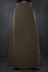 Chic olive green high-waisted Palazzo pants with a vintage-inspired wide-leg silhouette, crafted from lightweight crepe fabric with slight stretch for movement, featuring two working front pockets, perfect for creating a sophisticated yet relaxed outfit suitable for both professional and social settings.