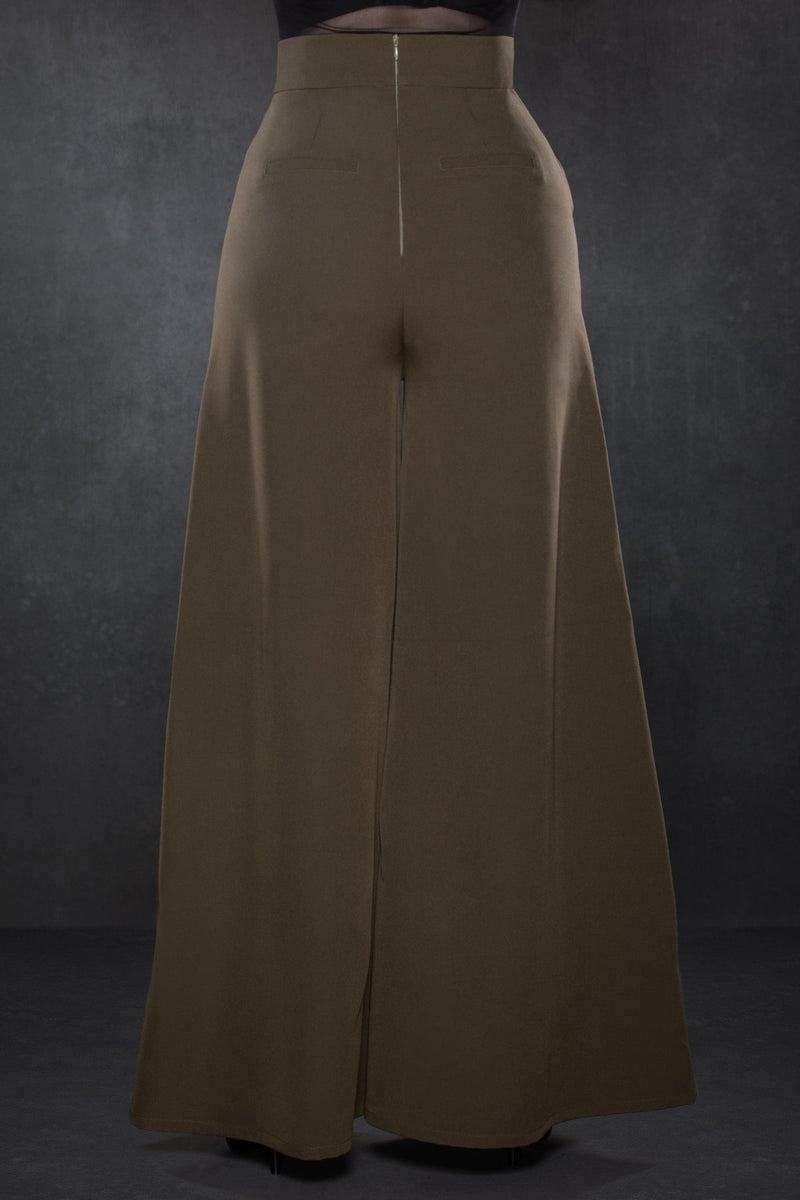 Versatile olive green Palazzo pants with a vintage 1940s-inspired wide-leg silhouette, crafted from lightweight crepe fabric with subtle stretch, designed with a high-rise waist and two working front pockets, offering a timeless, flattering fit suitable for office wear, casual brunches, or evening occasions.