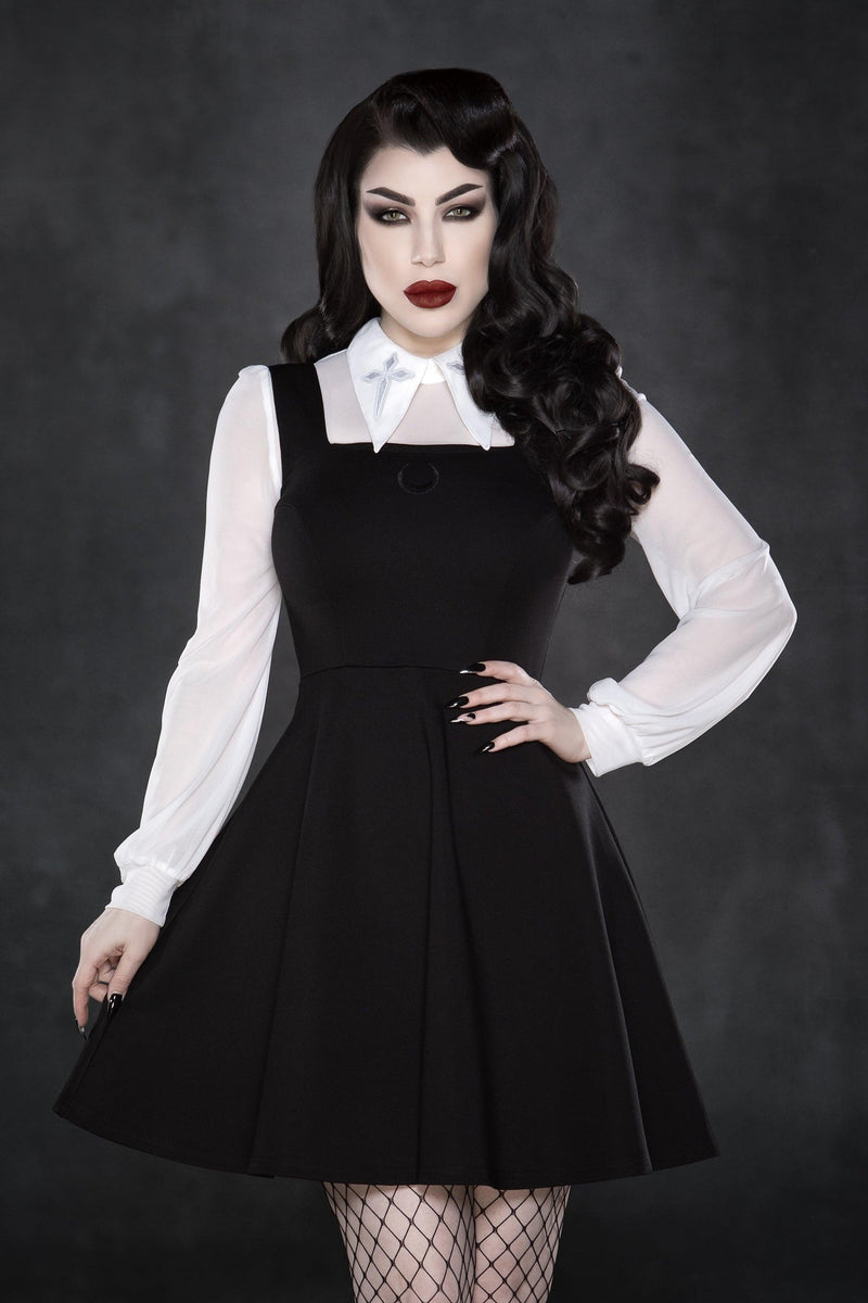 Statement mesh long-sleeve top with semi-sheer soft fabric, embroidered cross patches on a striking extended collar, a daring keyhole back for subtle allure, and stretchy material for comfort and movement, ideal for gothic streetwear, edgy fashion outfits, or festival-inspired styling.