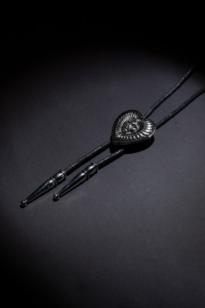 Handcrafted custom bolo tie with dual photo lockets and engraved brand logo, carefully made from durable, high-quality metals and leathers to ensure a refined finish and personal touch, ideal for weddings, anniversaries, or special events.