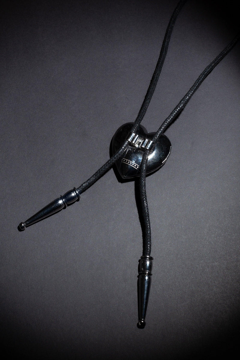 Premium handcrafted bolo tie made in small batches, featuring two personalized photo lockets and detailed logo engraving, combining quality materials with a custom design that highlights both elegance and individuality for any occasion.