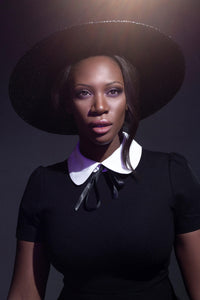 Add mystical flair to your look with the Sorceress Hat by KATAKOMB — a handmade straw hat with a dramatic wide brim that keeps you stylishly shielded from the sun or moonlight alike.