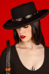 Handcrafted spiked hat belt made from 100% vegan leather, featuring a sleek black band with contrasting silver spikes. Adjustable one-size design fits all hats and can be easily removed or swapped, adding a bold, edgy gothic touch to any hat in your collection.